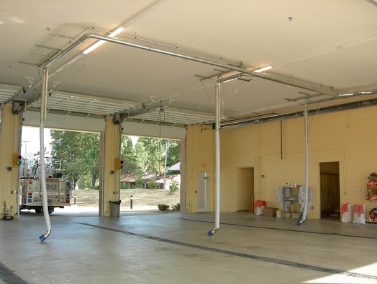 Firetruck in garage connected to vehicle exhaust removal system